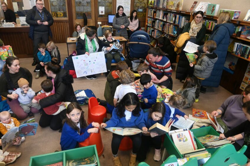 A "read in" was held at Ferryhill Library in March ahead of its closure, in budget cuts that also brought about the closure of Bucksburn pool. Image: Chris Sumner/DC Thomson