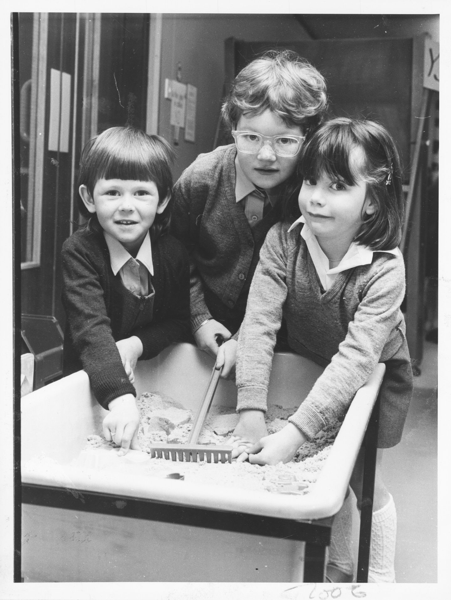 Primary 1 and 2 pupils Sharon Dawson, Vicky Morran and Caroline Sinclair enjoy the sandpit in their classroom at Danestone Primary School in 1986.