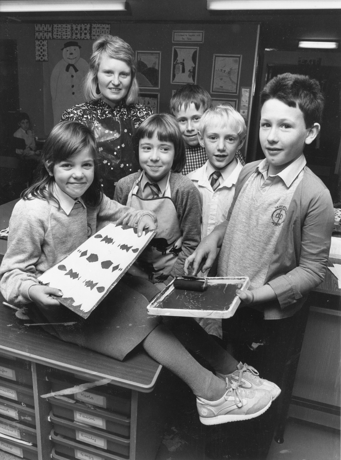 Danestone Primary teacher Christine Wilson with a group of pupils showing off handmade Christmas decorations in 1987.