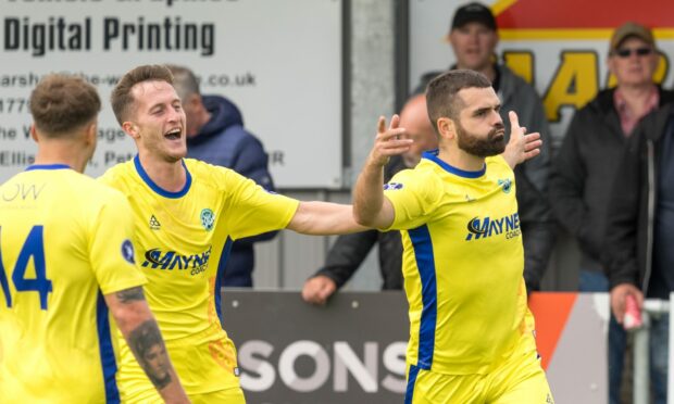 Buckie Thistle's Andrew MacAskill, right, celebrates with team-mates Dale Wood, centre, and Joe McCabe after scoring against Fraserburgh. Images: Jasperimage.