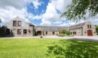 This amazing Ellon home has two gyms and a sauna.