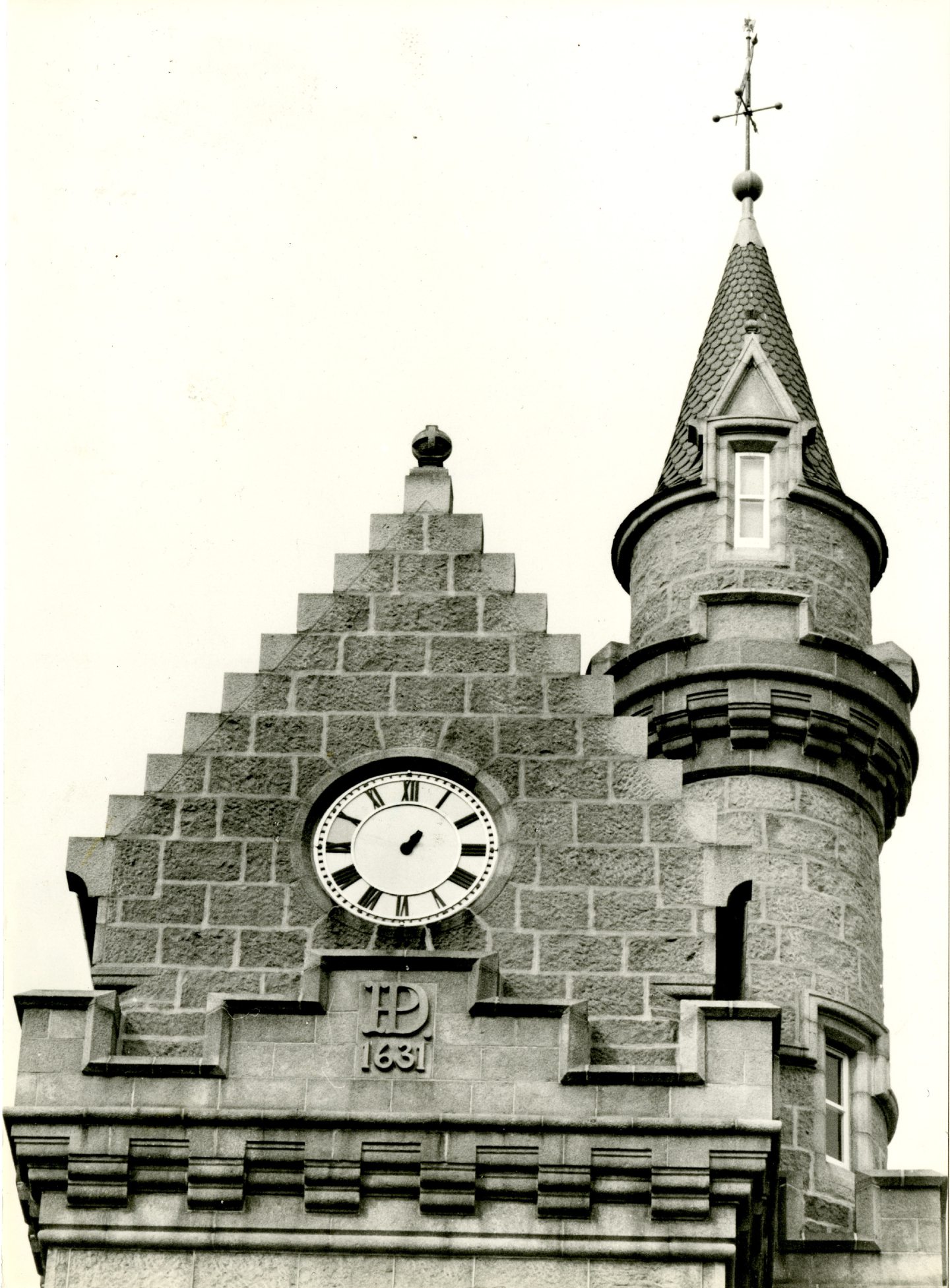 Exterior of the school's clock tower missing its hands in 1984.