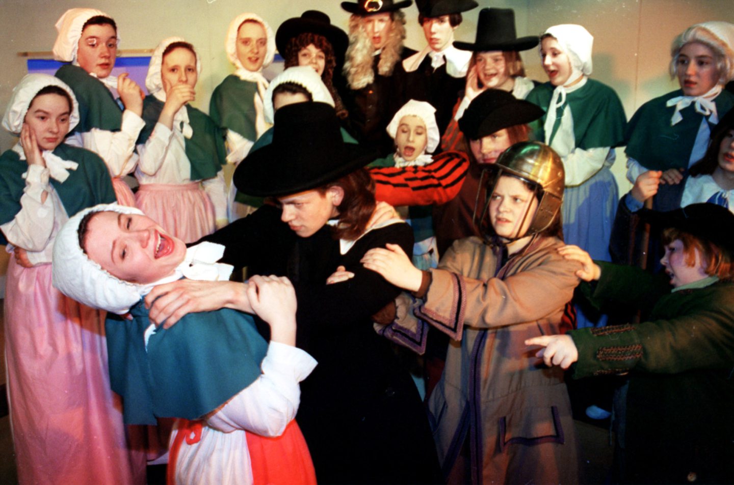 Pupils act out a scene from Arthur Miller's play The Crucible in 1995.