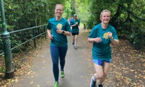Rebecca O'Hara, left, and Joanna Ewing pick their way through Ness Islands on a run with Inverness group Incredible Feet. Image: Andy Morton/DC Thomson