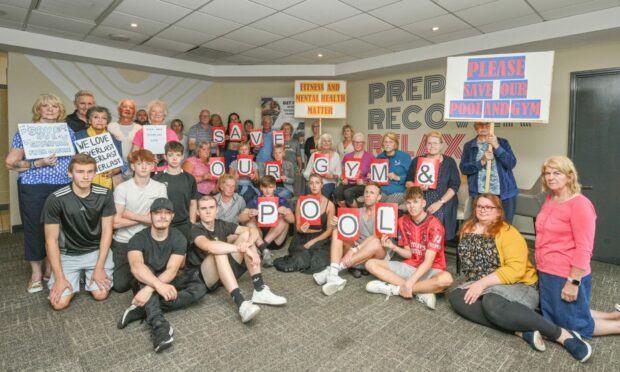 Gym members show their support with banners. Image: Jason Hedges/DC Thomson