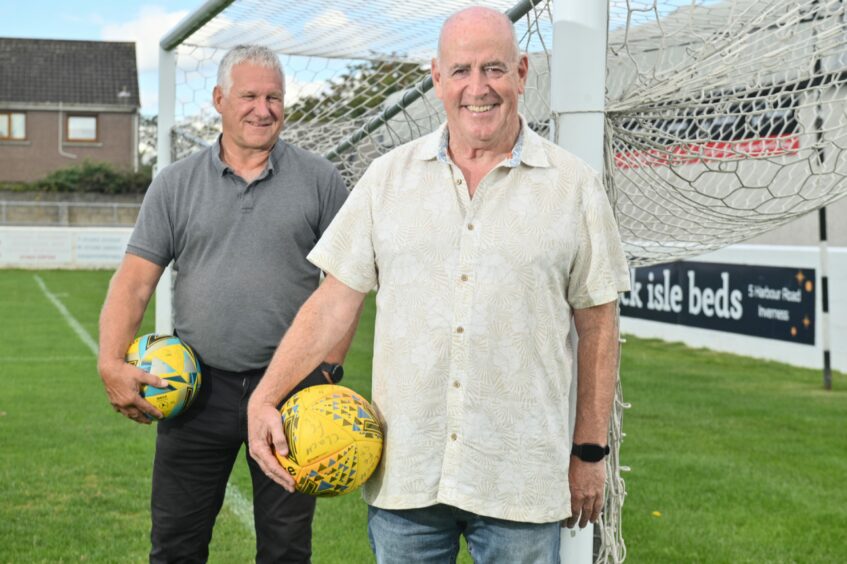 Billy MacDonald and Peter Corbett, Caledonian legend who recall winning the Inverness Cup, holding a football each next to the goal posts