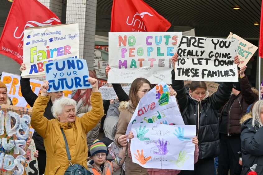 Protestors gathered at Aberdeen Town House on budget day in March 2023. Image: Kenny Elrick/DC Thomson