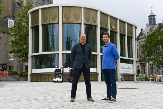 Company director John Wigglesworth and customer Glenn Coady are excited for the craft market on the terrace outside Common Sense Coffee House and Bar later this month. Image: Kenny Elrick/DC Thomson