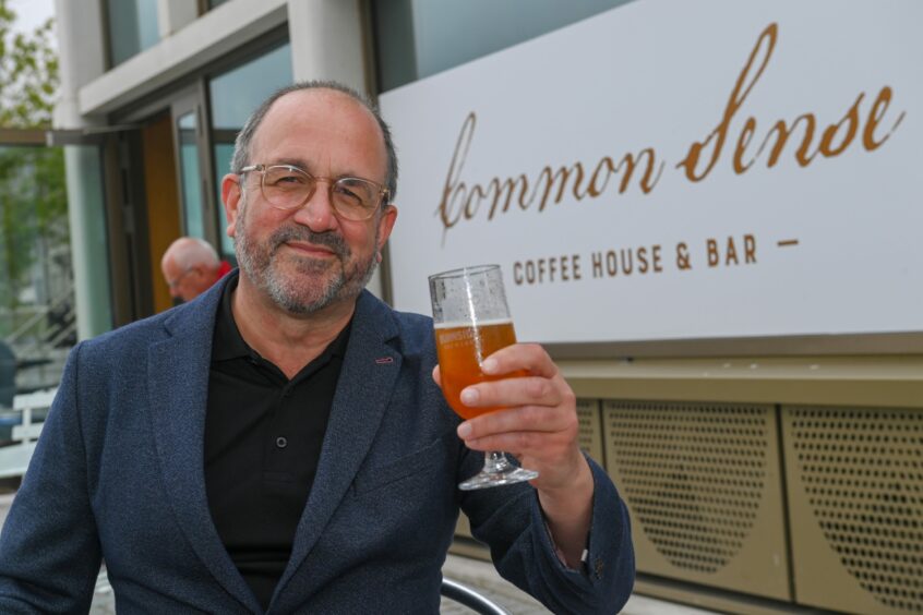 Common Sense Coffee House and Bar boss John Wigglesworth on his terrace overlooking Union Terrace Gardens in Aberdeen. Image: Kenny Elrick/DC Thomson