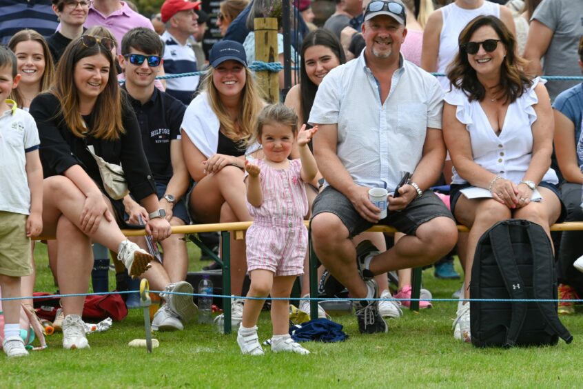 Families in the crowd at Ballater Highland Games 2023.