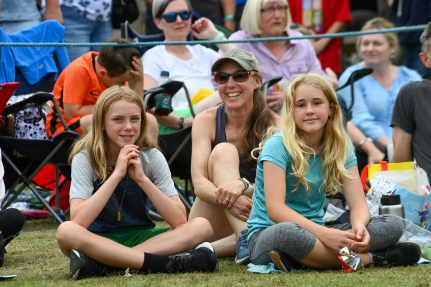 A woman and two young teenagers at Ballater Highland Games 2023
