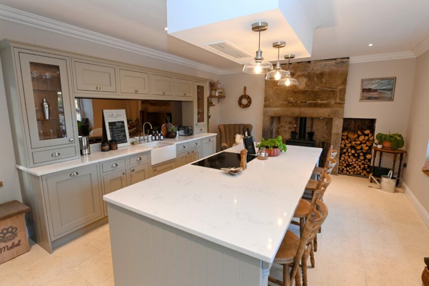 Large, airy kitchen after the farmhouse renovation.