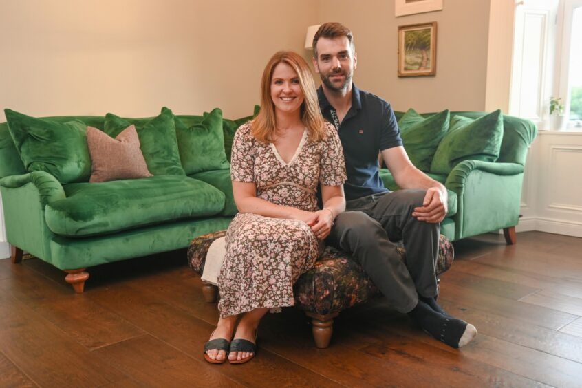 Aberdeenshire couple Kim and Ryan in the lounge of the newly renovated Cairnton Farmhouse.