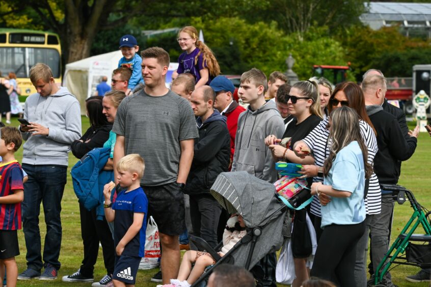 Spectators enjoying the wrestling. 