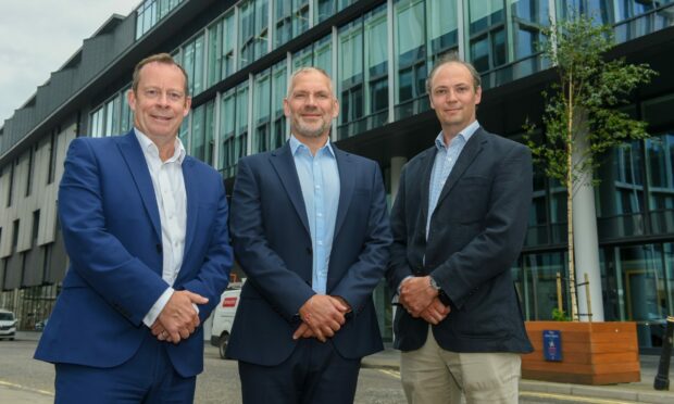 L-r property agent Graeme Nisbet, of FG Burnett, Donald MacLeod, operations manager, COSL and, Angus Powles, aaccount man,ager, COSL.