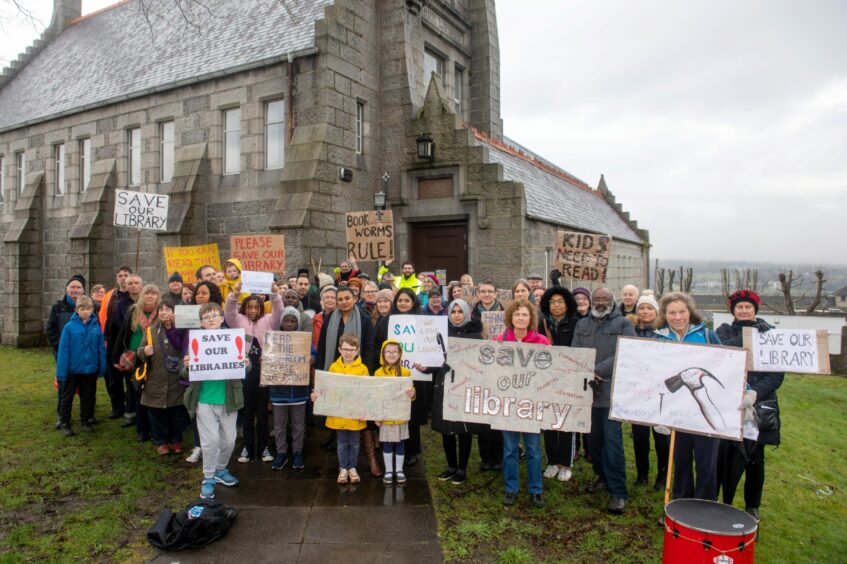 Protestors gathered outside Woodside Library in Aberdeen in March to urge a council rethink on its closure. Image: Kath Flannery/DC Thomson