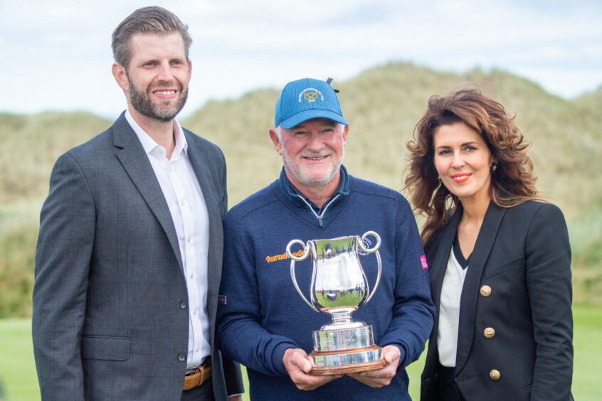 Staysure PGA Seniors Championship winner Peter Baker, with Eric Trump and Sarah Malone at Trump International Links.