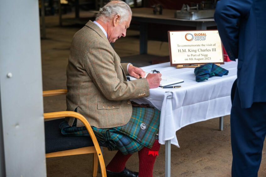 Signing the visitors book at Port of Nigg.