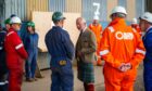 The King chats to some of the workforce at Port of Nigg.