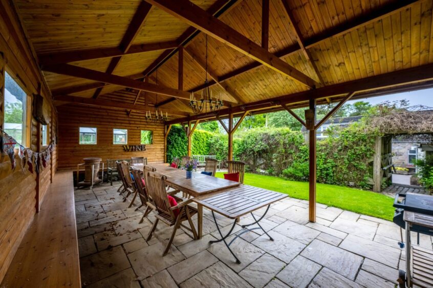 Barbeque area by the barn that comes with the house for sale in Inverurie.