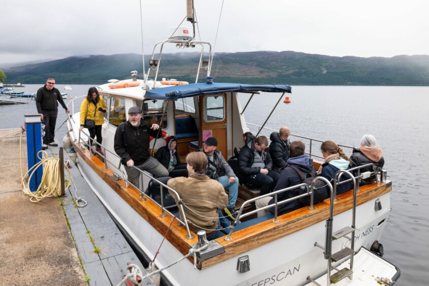 People on their way out on Loch Ness to search for Nessie in August