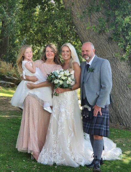 The owners of Eden Cottage at their daughter's wedding