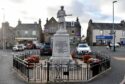 A rededication ceremony was held at Ellon's war memorial on Saturday - 100 years to the day since it was first unveiled. Image: Scott Baxter/DC Thomson.