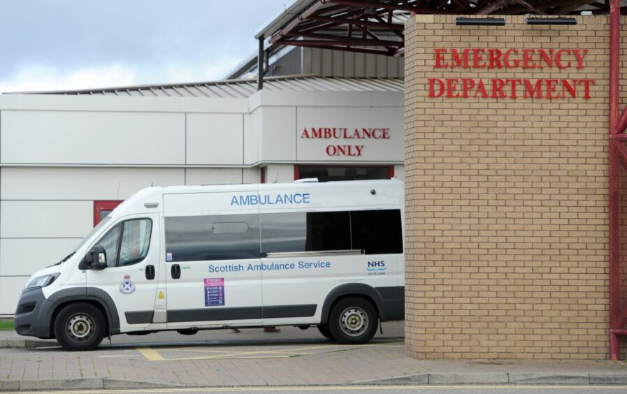An ambulance vehicle sits outside A&E at Raigmore Hospital. 
