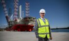 Port of Aberdeen chief executive Bob Sanguinetti, with offshore construction giant Blue Tern behind him.