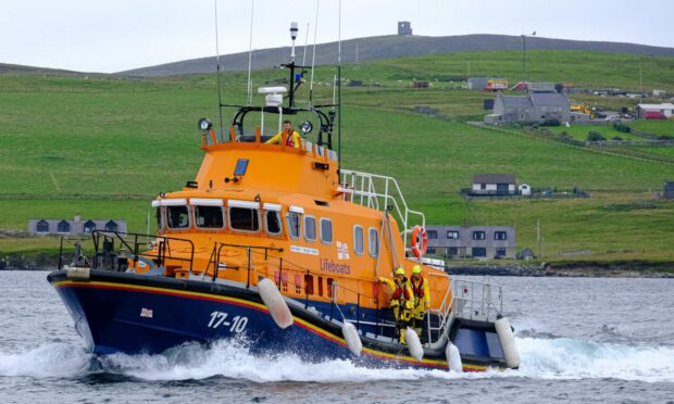 Lerwick Lifeboat returns to harbour after a call-out for a missing diver, who was found safe and well. Image: RNLI.