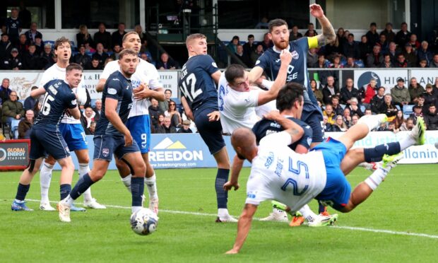 Kemar Roofe opens the scoring for Rangers against Ross County. Image: PA