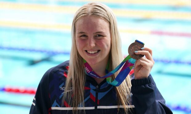 Great Britain's Faye Rogers with her Bronze medal from the Women's 400m S10 freestyle. Image: PA.