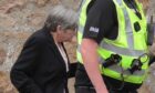 Sandra Harper received a police escort when leaving Peterhead Sheriff Court. Image: DC Thomson