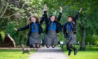 St Margaret's School for Girls pupils Rachel, Celine and Ellie were among those celebrating the school's record-breaking exam results. Image: Spey
