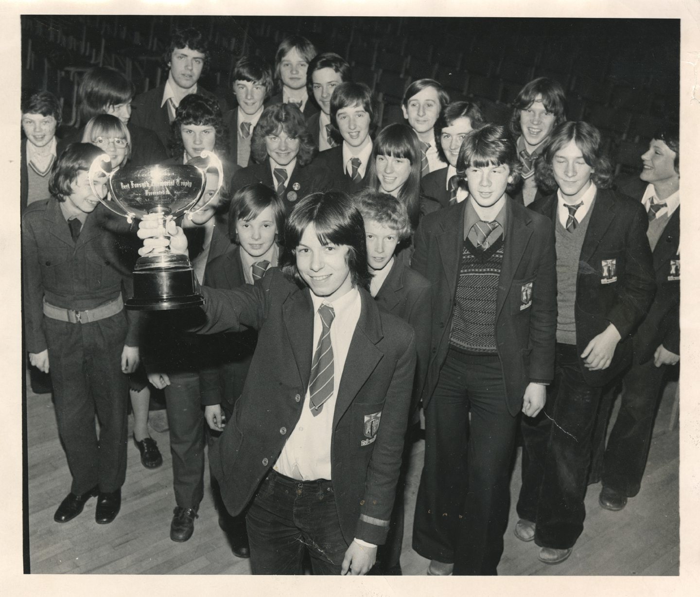 The table tennis toppers smile with their trophies after winning all three Aberdeen Schools Table Tennis Association leagues in 1978.