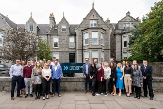 Full team stood outside the Hutcheon Mearns new Aberdeen office.