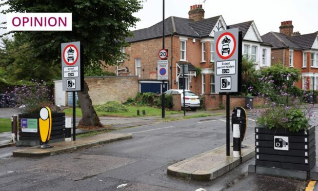Signs mark a Low Traffic Neighbourhood (LTN) in London (Image: Neil Hall/EPA-EFE/Shutterstock)