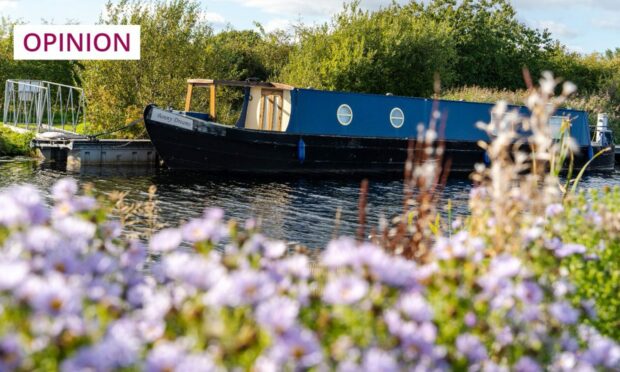 A barge on the Forth and Clyde Canal (Image: Hazel Plater/Shutterstock)