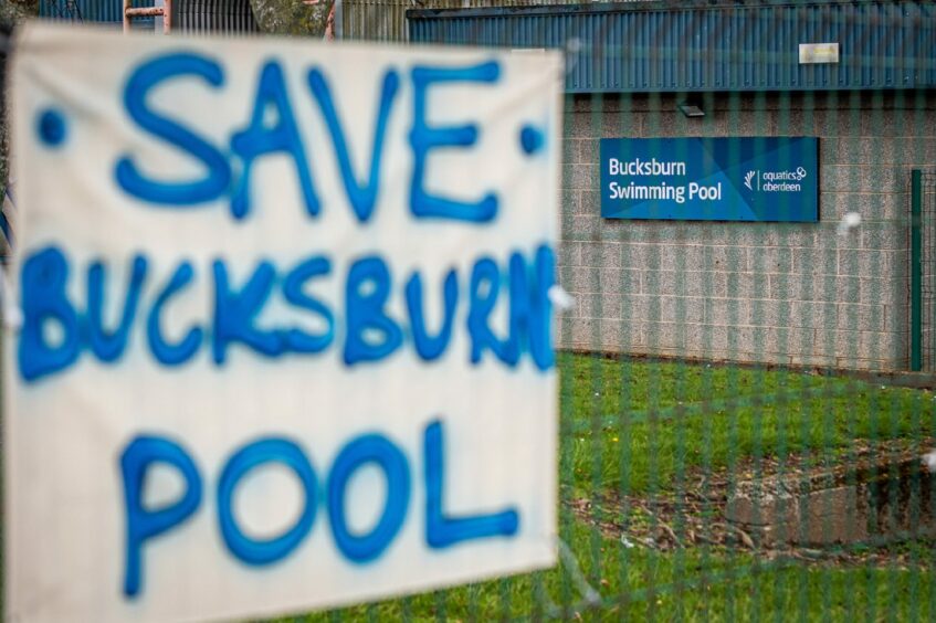  "Save Bucksburn Pool" demonstration sign outside Bucksburn Swimming Pool in Aberdeen on 30 April 2023, one day before the venue was closed due to council cuts.
