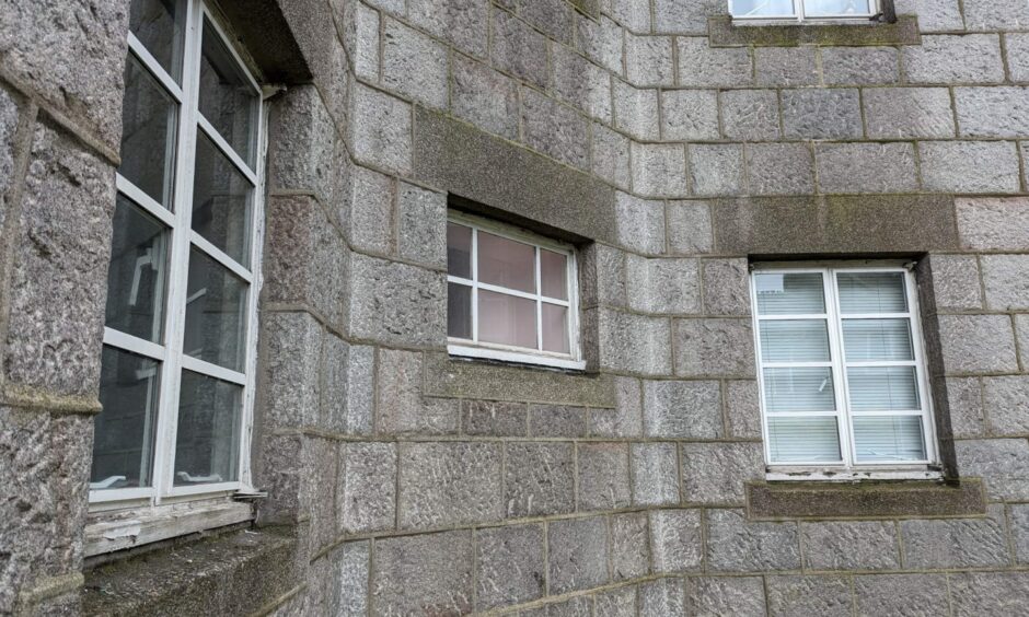 Window casings have been long in need of replacing at Rosemount Square in Aberdeen, after nearly 30 years exposed to the elements. Image: Alastair Gossip/DC Thomson