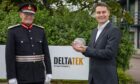 Last year's winners included Aberdeen firm DeltaTek Global, now part of Expro. DeltaTek founder Tristam Horn holds the award after receiving it from Aberdeen Lord Provost David Cameron, the King's representative in the Granite City.