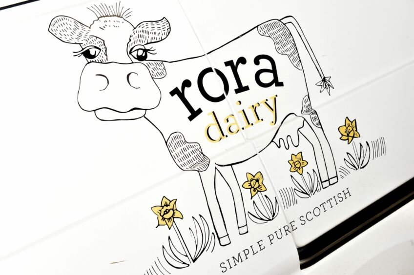Rora Dairy sign.