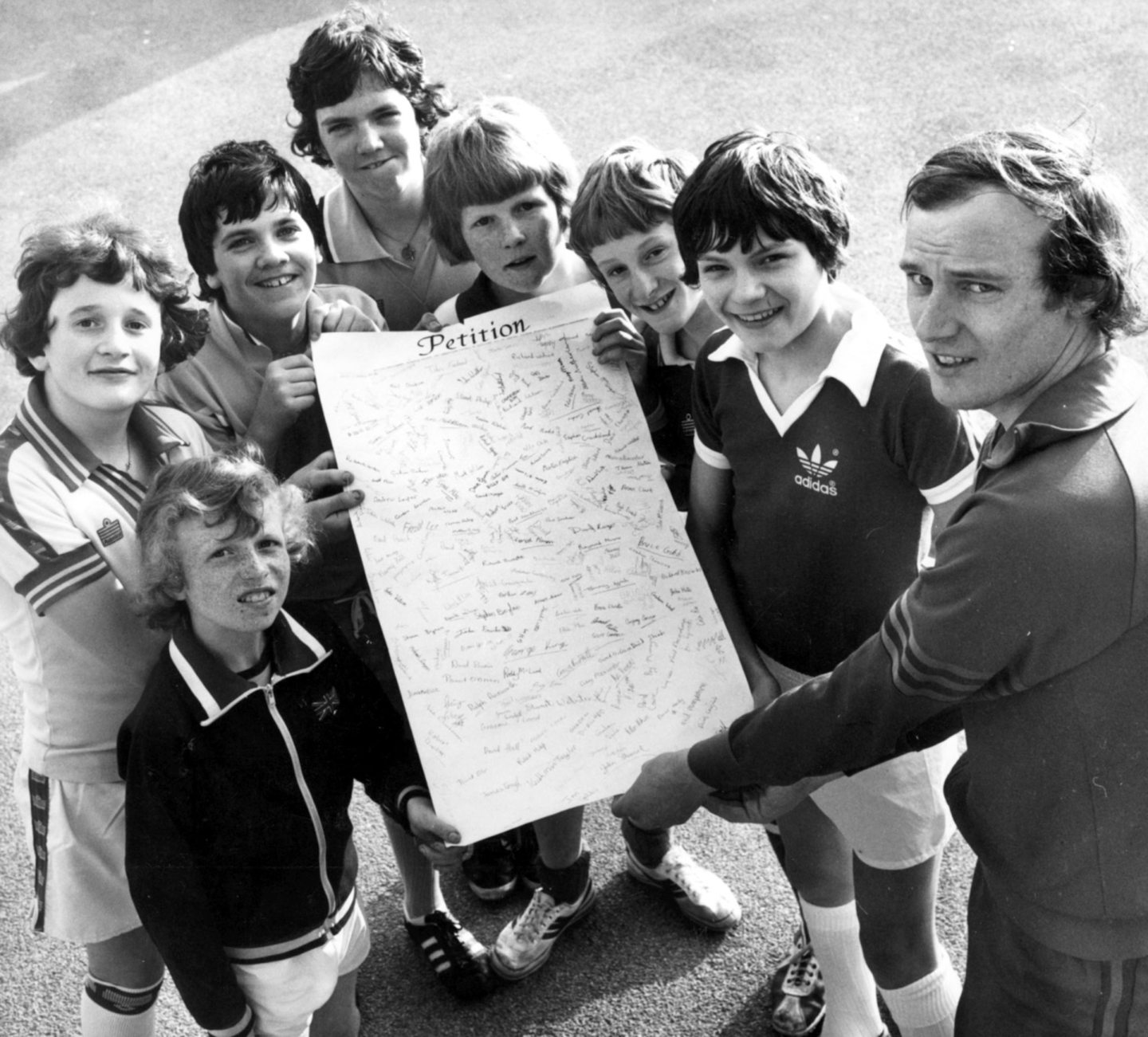 A petition of protests containing 200 names was handed over to Grampian Regional Council's director of education football-loving pupils at Aberdeen Grammar and Hazlehead Academy in 1978. Pictured with the petition are Grammar School boys and secretary to the Grampian Union of Boys' Clubs, Neil Paterson.