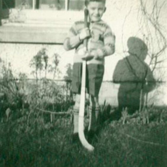 Hugh Dan MacLennan with his first shinty stick