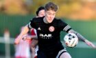 Kyle MacLeod, in action for Brora Rangers in 2018. Image: DC Thomson
