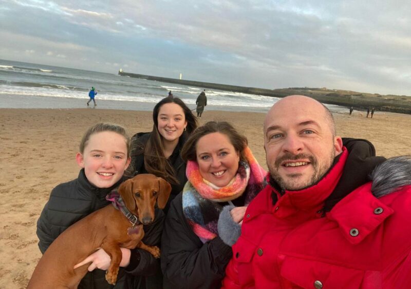 Cerri McDonald with husband Graeme and daughters Becky, 17, and Katie, 14, enjoy quality time together with dog Ness. Image: Prospect 13.