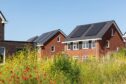 New build houses with solar panels.