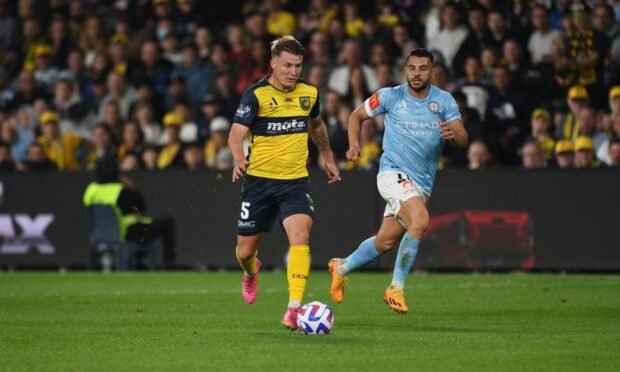James McGarry on the ball for Central Coast Mariners in the A-League Grand Final against Melbourne City. Image: Shutterstock.