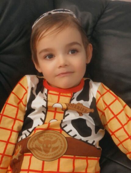 Caleb in Woody outfit