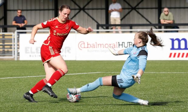 Bayley Hutchison scoring against Hamilton Accies in a SWPL match at Balmoral Stadium.